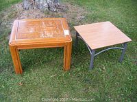 Both wood and metal frame end tables shown outdoors on grass next to tree, highlighting size and condition.
