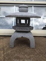 Front view of salt and pepper cut granite Kodai Yukimi lantern pagoda showing overall structure and finish