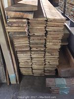Stack of 1x6 pine boards in various lengths