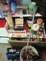 Overview of the tools and supplies including finishing sander box, tapes, screws and chemicals.