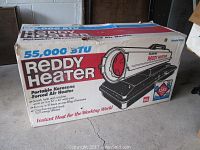 Original box of Reddy Heater Portable Kerosene Forced Air Heater showing model 1285 and 55,000 BTU output.