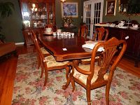 Full view of table set with six chairs and leaf installed