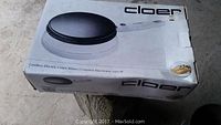 Boxed Cloer cordless electric crêpe maker showing product image on top of box.