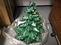 Full view of the ceramic Christmas tree from above, showing the overall shape and painted bulb decorations.