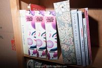 Photo of McCall's Cooking School 3-volume boxed set and several cookbooks including Food, Health and Happiness, Saute Sauces, and Weight Watchers.