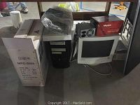 View of Yamaha MPC-9000 box, desktop tower, Princeton CRT monitor, and Maxtor hard drive box on a table.