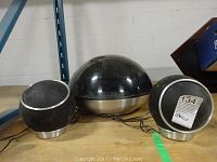 Front view of dome turntable with two spherical speakers