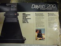 Photo of Daylab 200 box showing the enlarger/processor with feature text.
