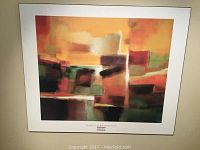 Front view of one art plaque with abstract print and signature by Nancy Orelestone.