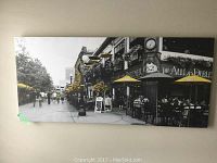 Front view of fabric picture showing outdoor pub scene with yellow accents.