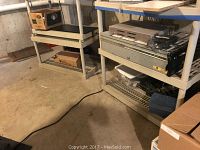 IBM Nexfinity 6000R server and shelves with assorted electronics and parts