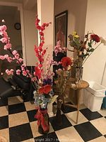 Full view of the faux floral arrangements and folding snack table placement.