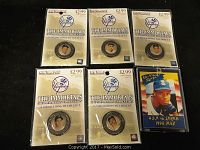 Five sealed medallion packages from 'The Immortals' 2005 New York Yankees collection featuring different players, arranged flat showing front packaging.