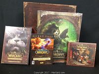 Photo of all items in the World of Warcraft Special Edition Collector Set including game box, art book, CDs, and cards.