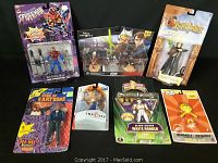 Full overview of all seven collectible figures showing packaging and condition