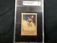 Front of the Jim McFadden 1951-52 Parkhurst rookie card graded 5 EX in a protective holder