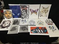 Collection of 15 Native art prints by Hubert Billy showing a variety of animal and Indigenous motifs including wolves, bears, paw prints, an orca, butterfly, and portraits
