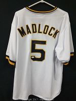 Back view of the white Pittsburgh Pirates jersey showing the name MADLOCK and number 5