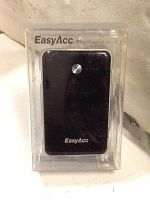 Front view of EasyAcc 7000mAh portable power bank in clear plastic packaging.