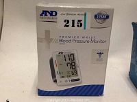 Front view of the sealed box of A&D Medical Premier Wrist Blood Pressure Monitor UB-543 showing product image and features including 5-year warranty.