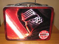 Front view of the lunch box showing the Kylo Ren graphic and Fan Expo World Premiere logo