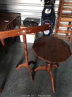 Octagonal tilt top table and wooden quilt rack side by side showing shape and structure