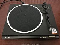Top view of the Technics SL-B260 turntable showing the platter, tonearm, and the main controls on the front edge.