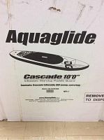 Box of Aquaglide Cascade 10'0" Inflatable Standup Paddle Board showing brand name, model, and contents list