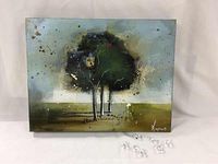 Canvas painting depicting three stylized trees with speckled paint accents against a blue sky and green field