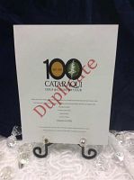 Front view of the Cataraqui Golf & Country Club voucher showing 100th anniversary logo and text details