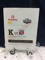 Printed voucher featuring Rogers and K-Rock logos, Kingston Frontenacs vs Kitchener Rangers match details, and box seats for 25