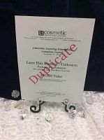 Printed gift certificate for six underarm laser hair removal treatments valued at $375 from U Cosmetic Medicine, Laser & Vein Clinic, stamped “Duplicate”