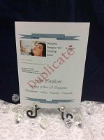 Full view of printed gift certificate on decorative stand with acrylic crystals