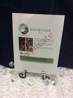 Printed Beachcomber Hot Tubs gift certificate on white card stock displayed upright