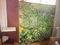 Front view of Plantation #6 with Dandelions painting leaning against wooden door and radiator