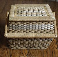 Front view of the vintage woven sewing box showing tightly woven natural fibers in beige and light brown tones with a removable top lid section.