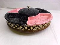 Front angle view of the assembled 5-piece MCM ceramic lazy Susan snack serving set on wooden base with decorative cutouts.