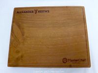Top view of the wooden cutting board with Alexander Keith's and MasterChef Canada logos visible.