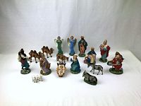 Overview of all 18 nativity figures arranged on white background