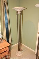Full view of the torchiere floor lamp showing height and shape.