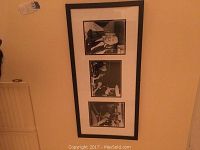 Two vertically stacked black and white prints with pool theme in a single large frame on wall