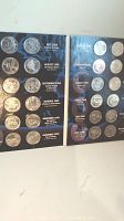 Two pages of a presentation binder showing 24 Canadian quarters from 1999 and 2000, each coin labeled by month and theme.
