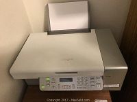 Lexmark All in One Printer showing control panel, paper tray, and overall top profile