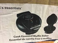 Photo showing the top of the muffin baker appliance with the 'Cupcake Factory' label and four muffin mold cavities.