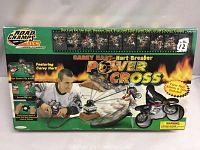 Front of original box showing the Carey Hart Hart Breaker Power Cross set with large graphic of Carey Hart and the bike, plus logo and branding. Box shows some edge wear.