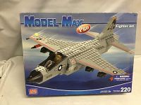 Front view of the Model Max Pro Mega Blocks 220-piece fighter jet box showing the assembled jet image, brand, piece count, and age recommendation.