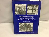 Front cover of the blue hardcover book titled "Remembering" by Stephen M. Fochuk featuring three black and white wartime photos.