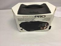 Original box showing product name and image of the headset on front. Dream Vision Pro branding and compatibility information visible.