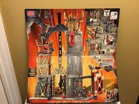 Box front showing assembled mega blocks playset including tower, dragon figure, and castle accessories, advertising 26 inch height