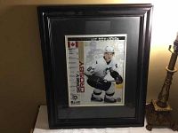 Framed Sidney Crosby Icebreakers picture showing player in hockey gear, black frame with matte border.